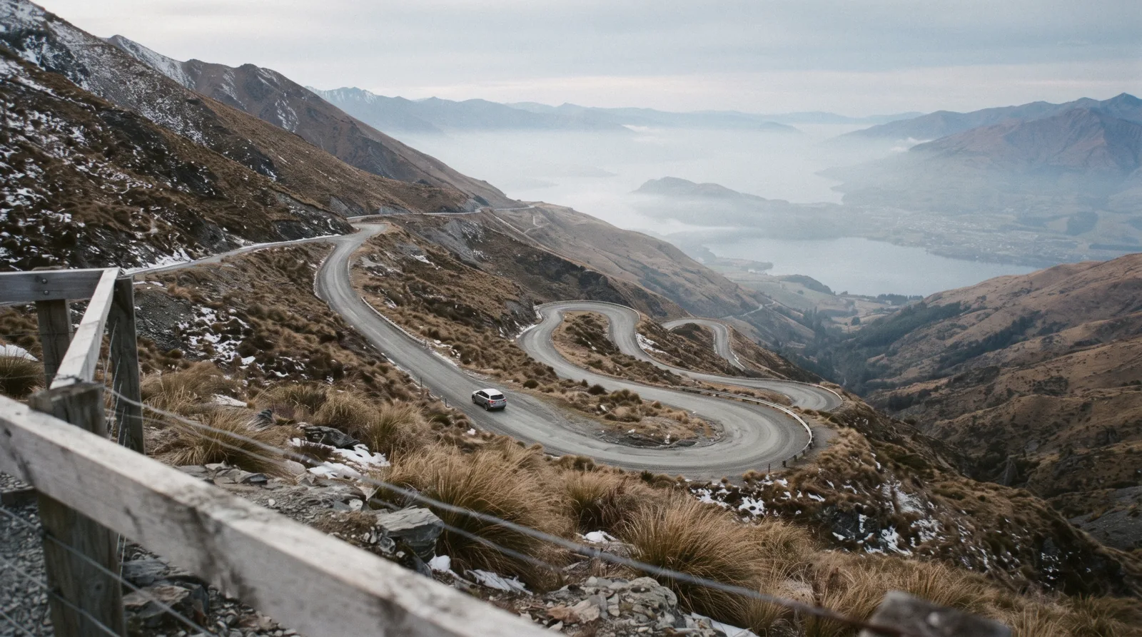 The road along the western shore of Lake Wakatipu towards the head of the lake, the shortest of the day trips from Queenstown, with the Humboldt Mountains ahead